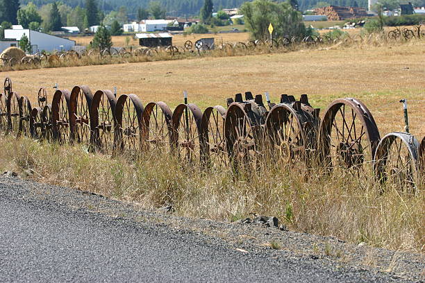 wheel old fence stock photo