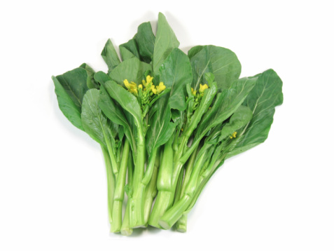 Fresh green choy sum vegetable isolated on white background