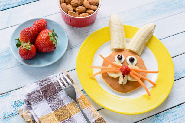 istock Colorful Easter breakfast for kids. Easter Bunny food art 925239412