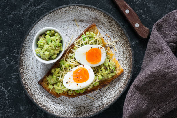 istock Toast with egg and avocado guacamole top view 925239580