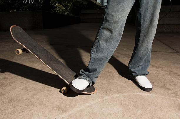 istock One young male on skateboard, low section 92524024