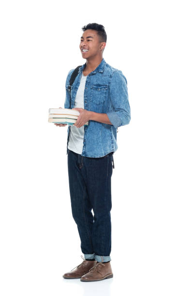 istock Hip young male student holding books 925240526