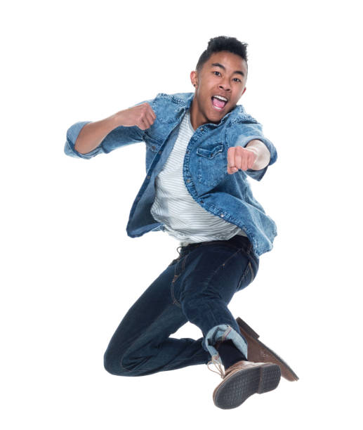 istock Handsome young male jumping 925240822