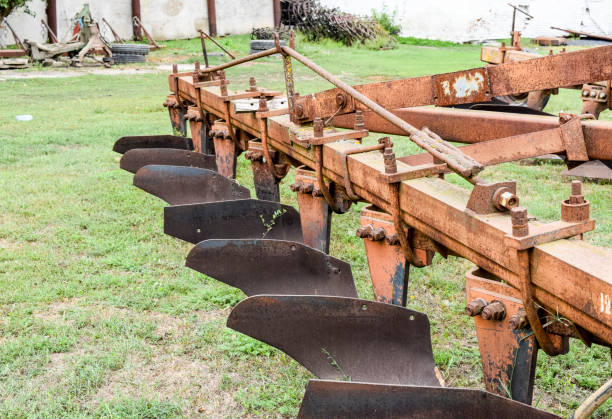 Plow on trailer for tractor. Plow for plowing soil. Trailer Hitch for tractors and combines. Trailers for agricultural machinery.