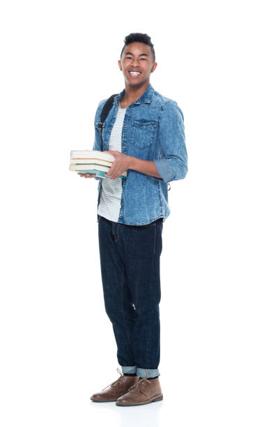 istock Hip young male student holding books 925241242