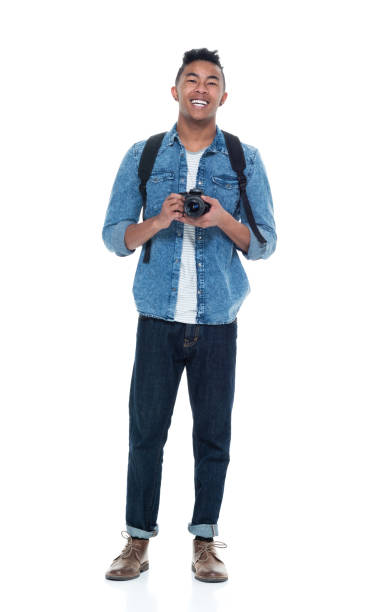 istock Handsome young male holding a camera 925241332