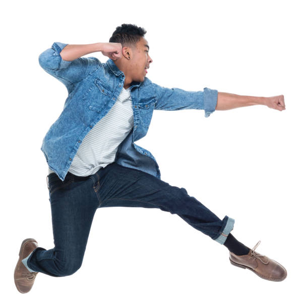 istock Handsome young male jumping 925241338