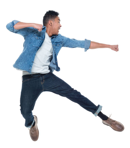 istock Handsome young male jumping 925243550