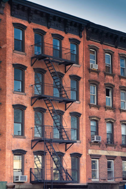 istock Fire escape on New York apartment block 925243808