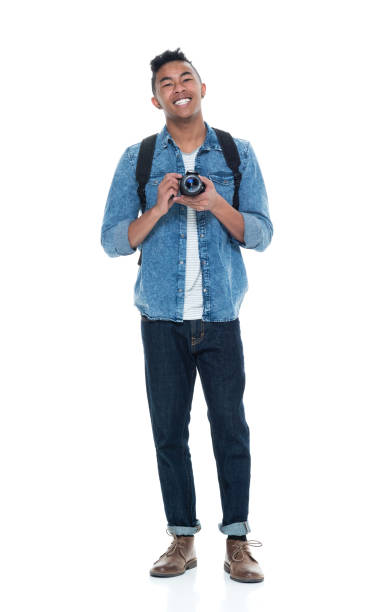 istock Handsome young male holding a camera 925243906