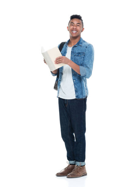 istock Hip young male student holding books 925243972