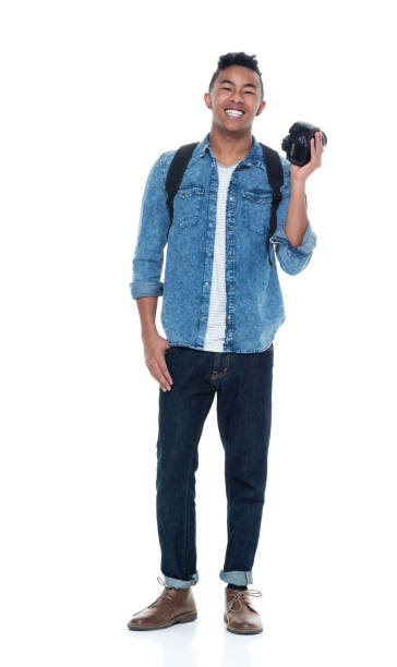 istock Handsome young male holding a camera 925243978
