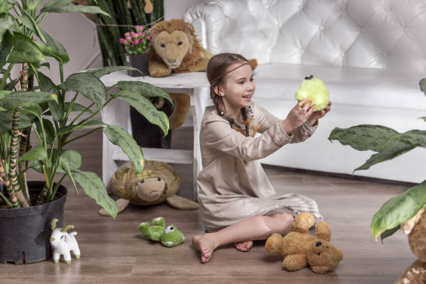 Funny Girl Playing with Toys