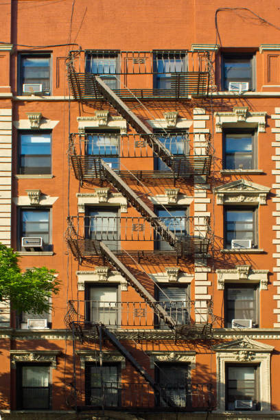istock Fire escape on New York apartment block 925244382