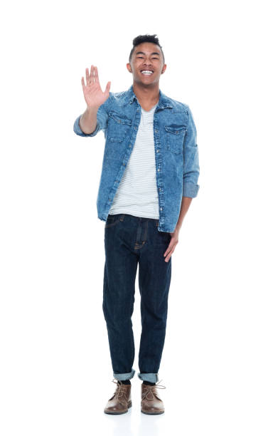 istock Handsome young male waving 925244568