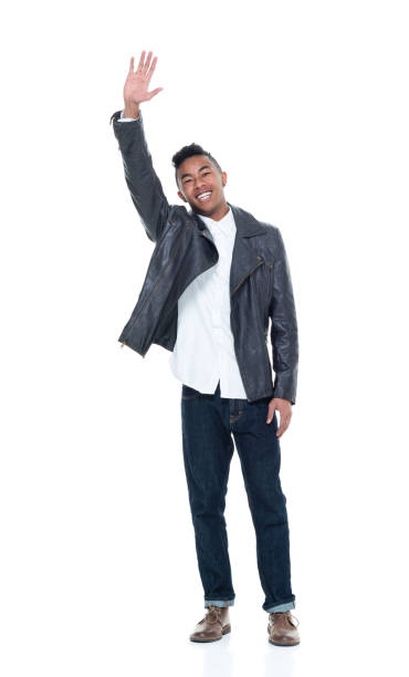 istock Good looking young man waving 925245226