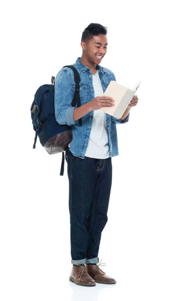 istock Hip young male student holding books 925245274