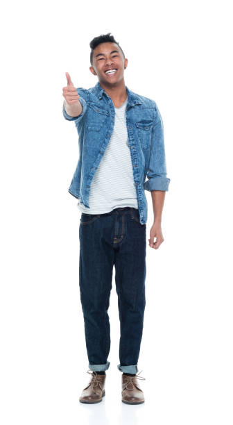 istock Handsome young male showing thumbs up 925247458
