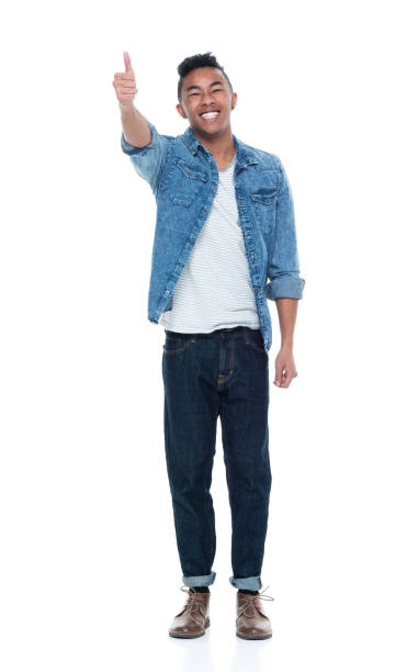istock Handsome young male showing thumbs up 925247524