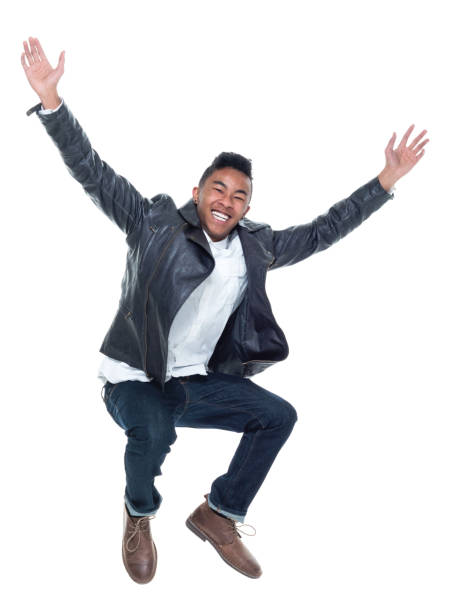 istock Good looking young man doing excited jumps 925247538