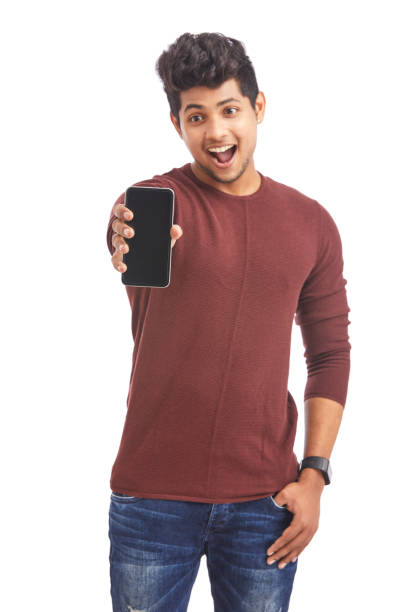 istock Cheerful Young Indian man showing smart phone 925248310