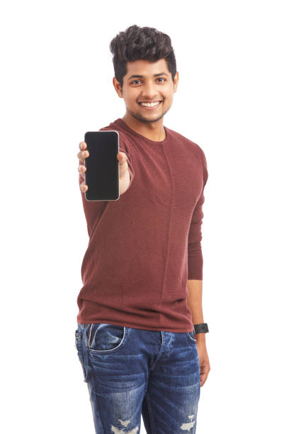 istock Cheerful Young Indian man showing smart phone 925248348