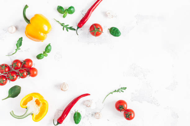 istock Vegetables, tomatoes, peppers, green leaves. Flat lay, top view 925248616