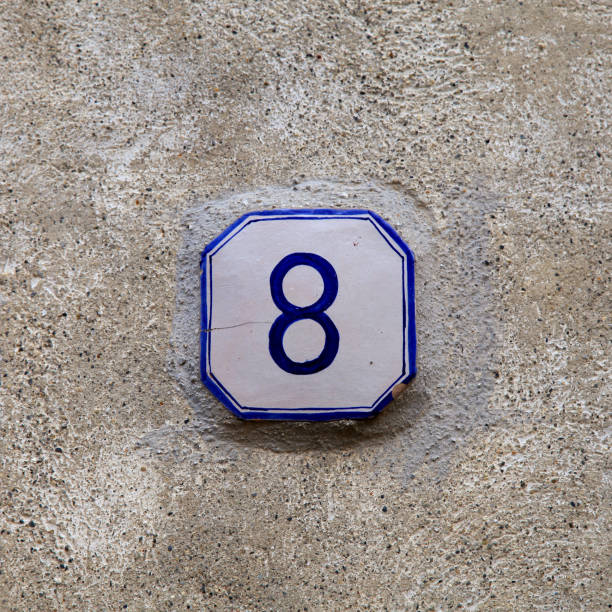 istock Element fixed on an house grey cement wall in a street in Italy. 925248952
