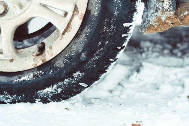 istock wheel in the snow 925252464