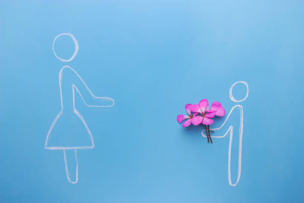 istock men give heart and flowers 925255344