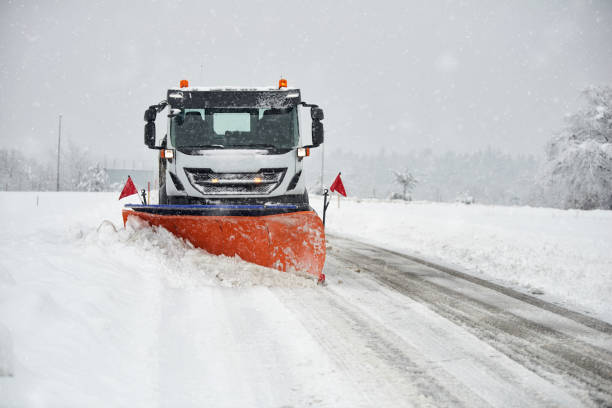 istock Snow plow at work - plowing snow from road 925256286