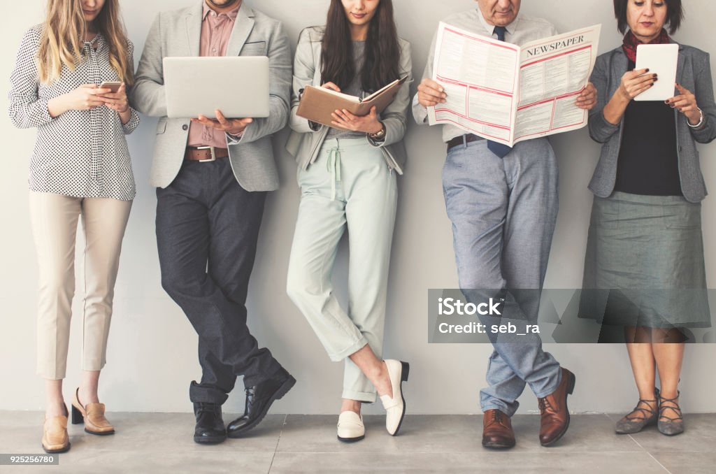 Group of business people Newspaper Stock Photo