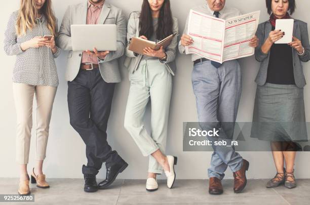 Group Of Business People Stock Photo - Download Image Now - Newspaper, The Media, Reading