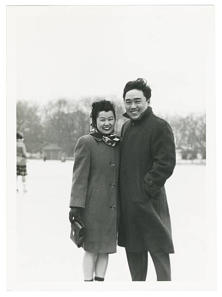 istock Asian Couple Ice Skating 92525888