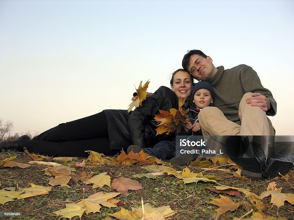 family with autumn leaves 2  Adult Stock Photo