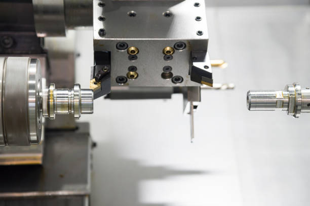 istock The  CNC lathe machine cutting the  metal shaft 925268124