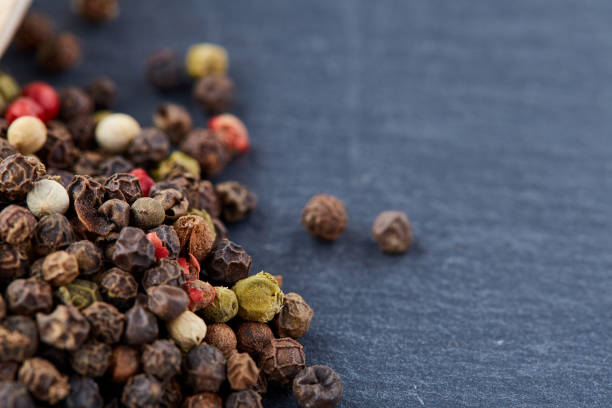 istock mixture of pepper peas powder scattered on a slate plate 925268246