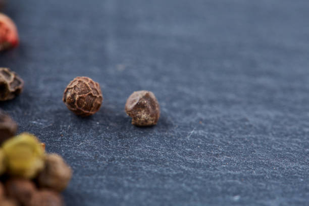 istock mixture of pepper peas powder scattered on a slate plate 925268346