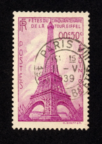 A beautiful antique pink stamp from France with a wonderful rendering of the Eiffel Tower, complete with cancellation mark clearly reading \