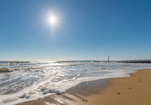 Waves coming in on Bournemouth Beach in Dorset Waves coming in on Bournemouth Beach in Dorset boscombe photos stock pictures, royalty-free photos & images