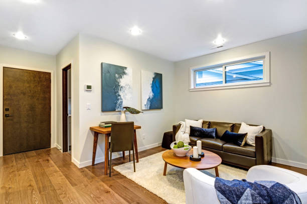 istock New custom built home with a white and brown Sitting room 925275872