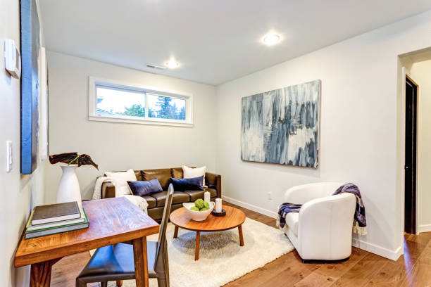 istock New custom built home with a white and brown Sitting room 925275956