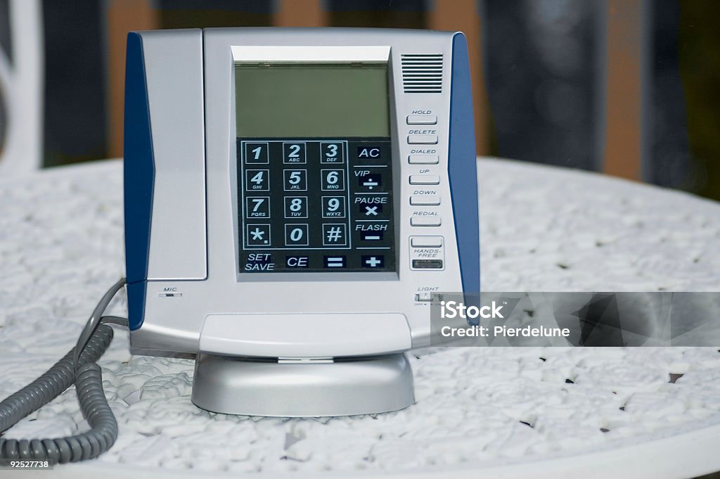 Синий и серый металлизированный телефон - Стоковые фото Бизнес роялти-фри