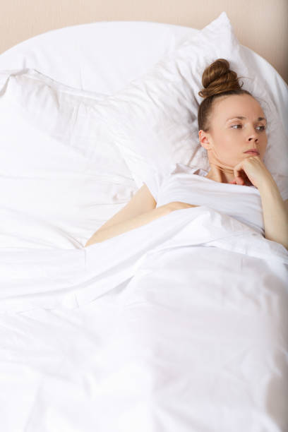 istock Young offended lady between 30 and 40 years old stays in her bed. 925280934