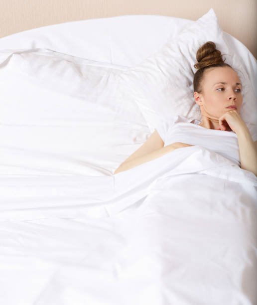istock Young offended lady between 30 and 40 years old stays in her bed. 925280936