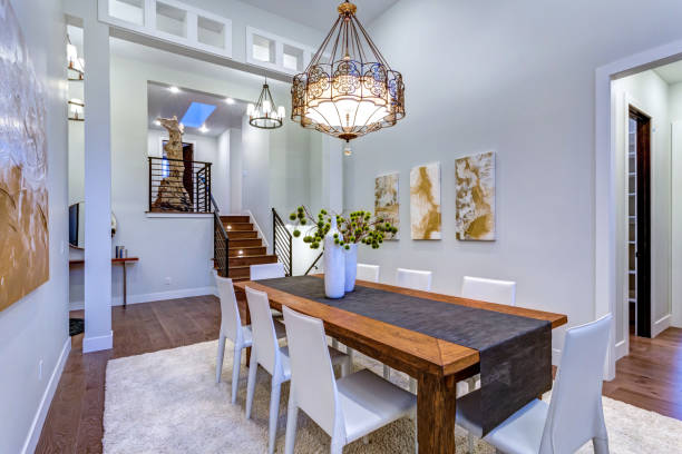 istock New custom built home boasts spacious dining area with high ceiling 925283318