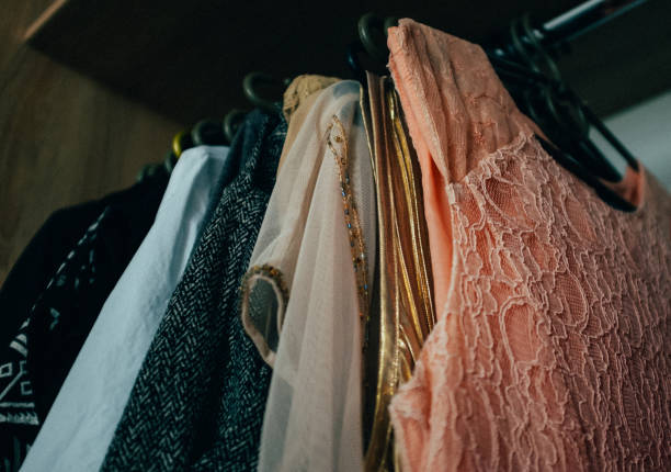 istock Many different dresses in wardrobe, clothes in ladys dressing ro 925283340