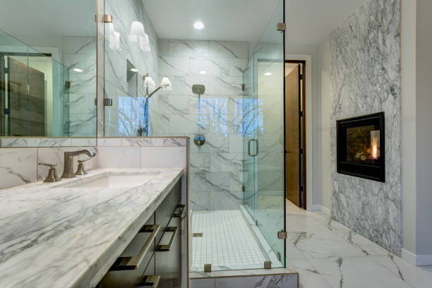 Incredible marble bathroom with fireplace. stock photo