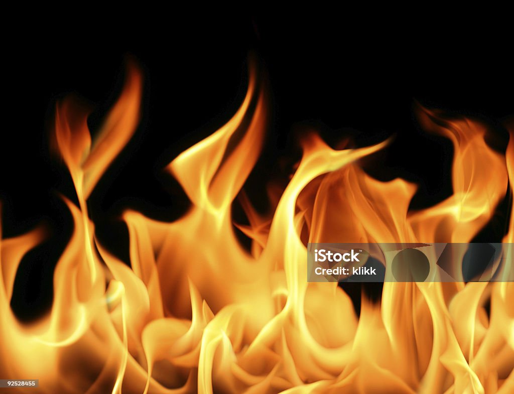 Flames against black background Close-up of fire and flames on a black background ( Huge file ) Black Background Stock Photo