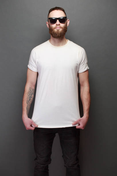istock Hipster handsome male model with beard wearing white blank t-shirt 925285024
